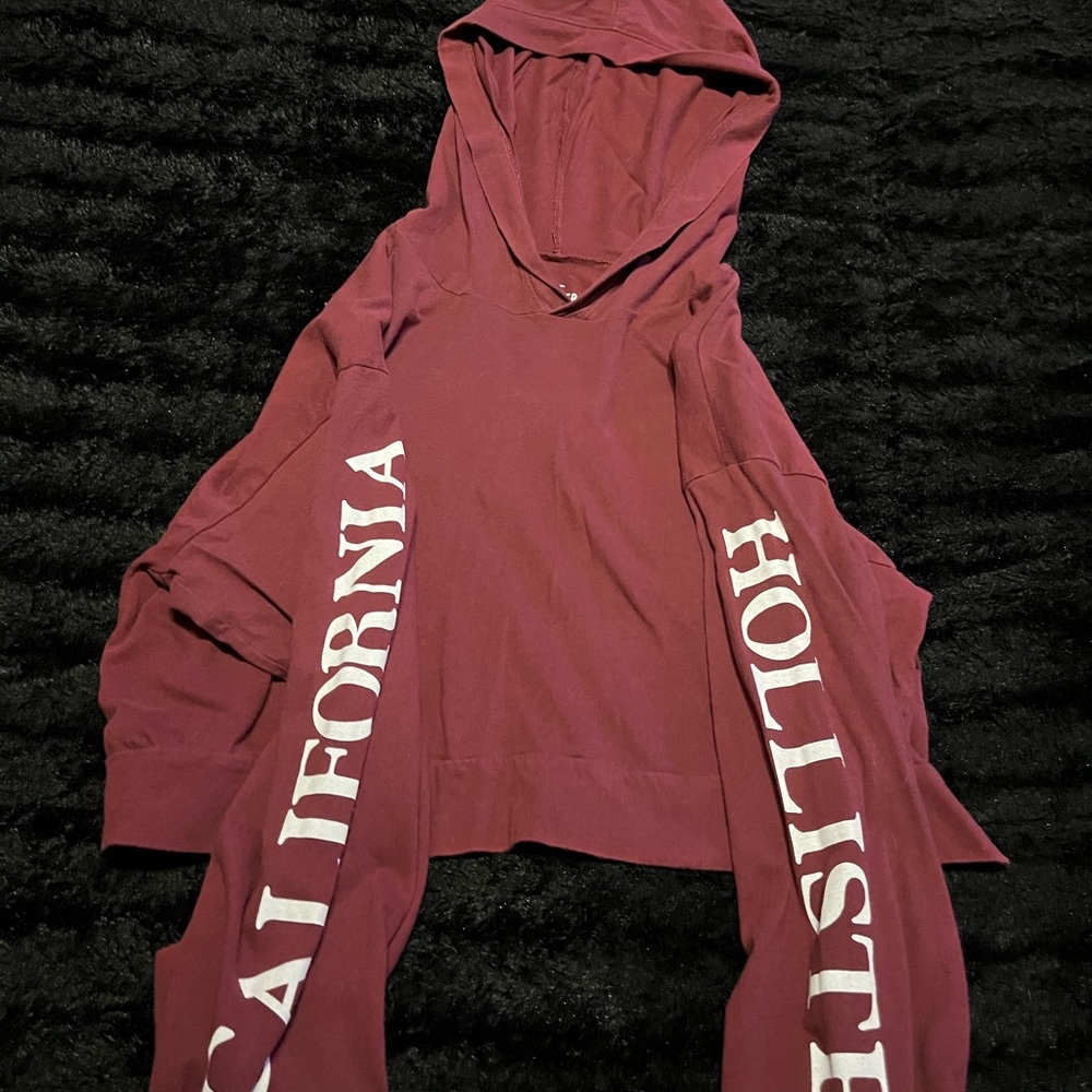 Hollister red crop top. Fabric is soft and the sleeves are a bit long.